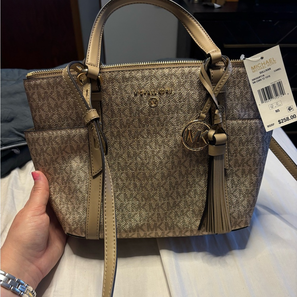 Brand New Michael Kors small crossbody tote with cute tassel